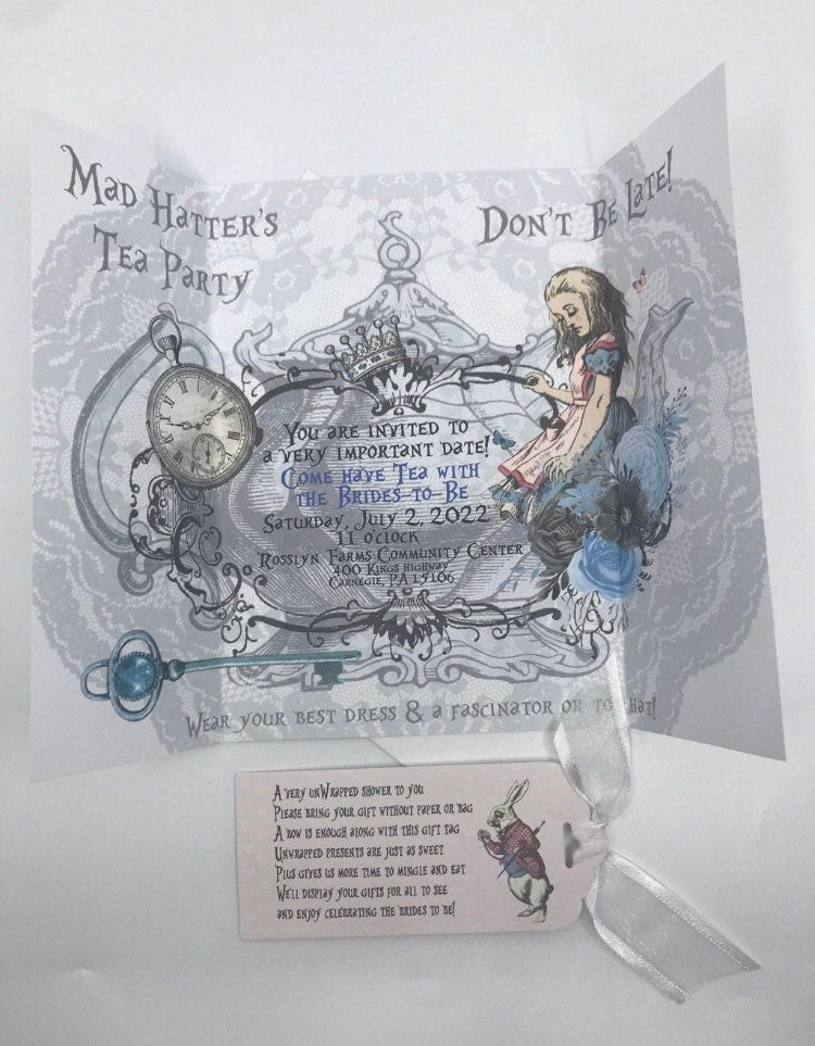 20 Gatefold Alice in Wonderland Invitations, 20 Bridal Shower tags and 20 Alice Party Favors in various pastel teacups