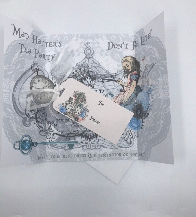 20 Gatefold Alice in Wonderland Invitations, 20 Bridal Shower tags and 20 Alice Party Favors in various pastel teacups