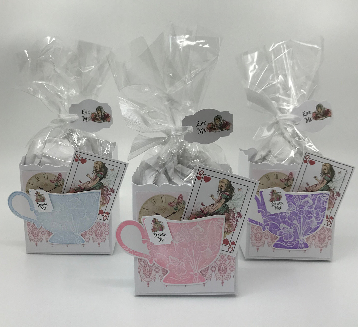 20 Gatefold Alice in Wonderland Invitations, 20 Bridal Shower tags and 20 Alice Party Favors in various pastel teacups